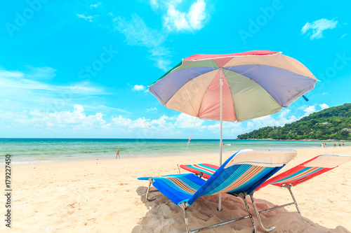 Ka-ron Beach at Phuket , Thailand. White sand beach with beach umbrella. Summer, Travel, Vacation and Holiday concept. © PRASERT