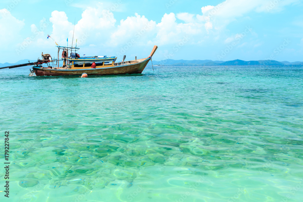 Longtail boats floating on the Sea at Phuket, Thailand. Summer, Travel, Vacation and Holiday concept.