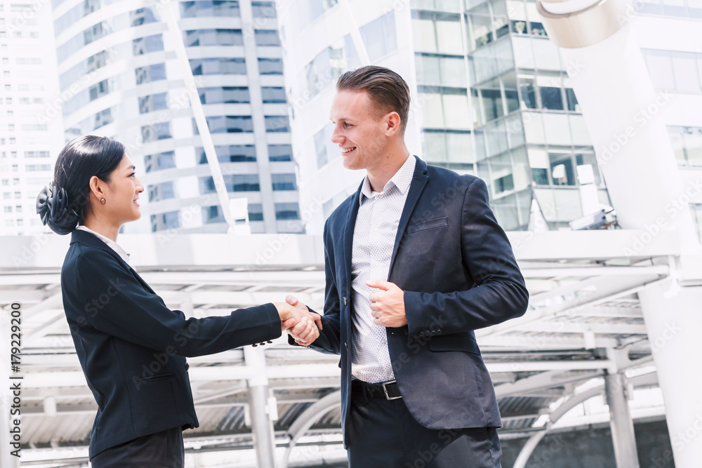 Handshake of business partners Handshake of business partners