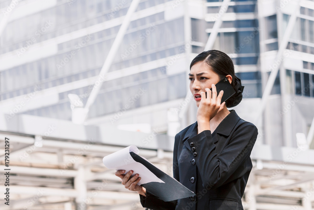 Portrait of businesswoman using smartphone Portrait of businesswoman using smartphone
