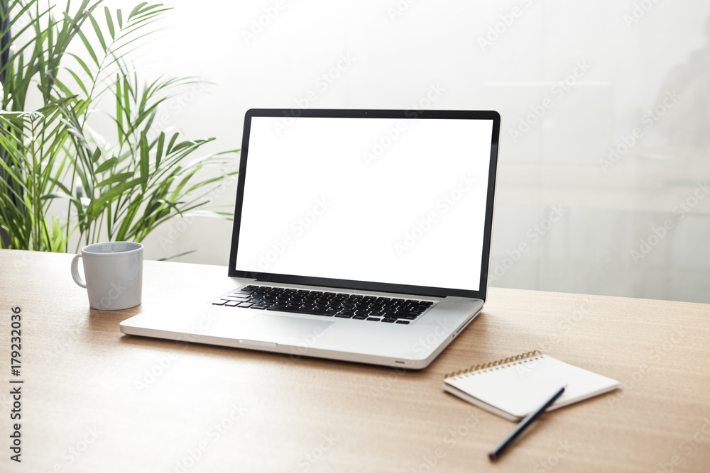 notebook with stationary on the wooden desk at the office. notebook with stationary on the wooden desk at the office.