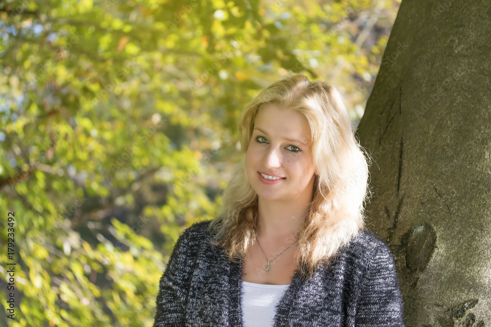 Portrait of smiling young woman. Horizontally. Portrait of smiling young woman. Horizontally.