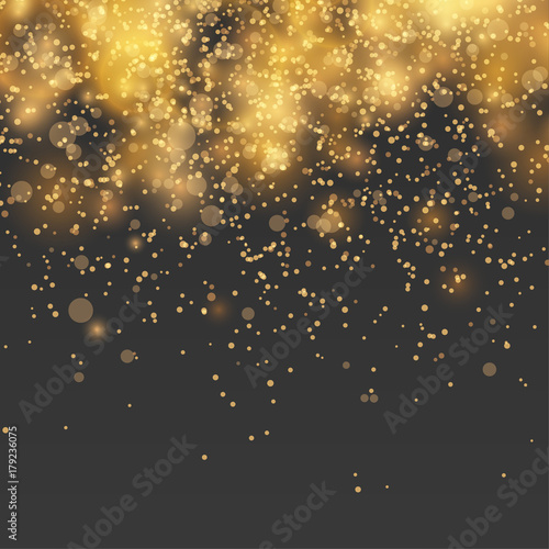 New Year falling sparkles abstract background over dark