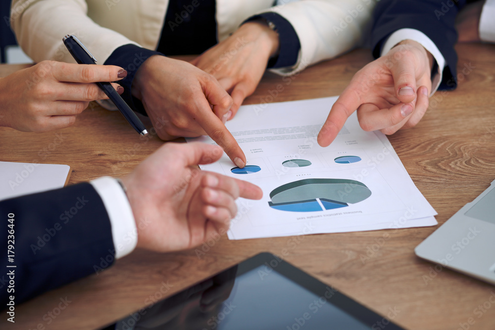 Fototapeta premium Group of business people or lawyers at meeting, hands close-up