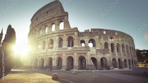 Colosseum in Rome and morning sun, Italy