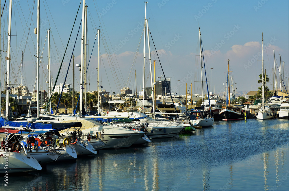 Marina bay with moored sailboats, Cyprus.