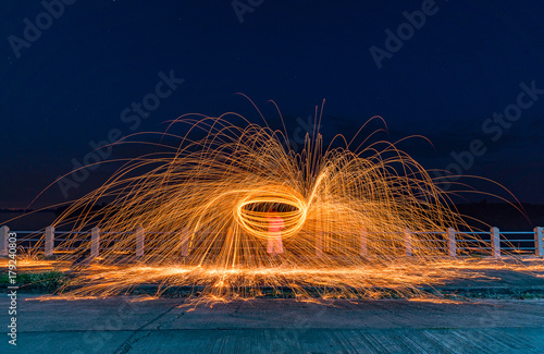 Man Spinning Burning Steel Wool