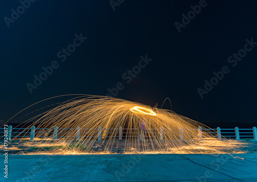 Man Spinning Burning Steel Wool
