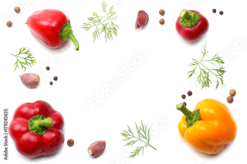 sliced sweet bell pepper, garlic and parsley isolated on white background. top view