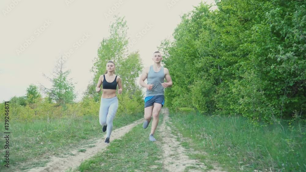 The guy with the girl is running The guy with the girl is running