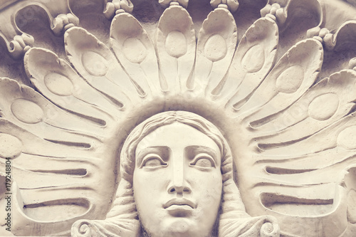 Tableau sur toile Stone bas-relief with a woman's head