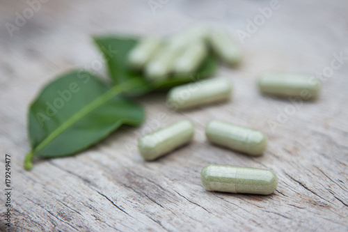 Herbal medicine in capsules from organic herb for healthy eating 
