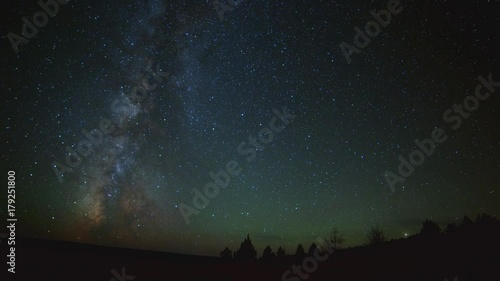 Milky way in desert with Western Juniper trees South Steens Mountain near Malheur National Wildlife Refuge photo