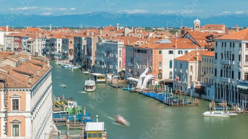 Top view on central busy canal in Venice timelapse, on both sides masterpieces of Venetian architecture photo