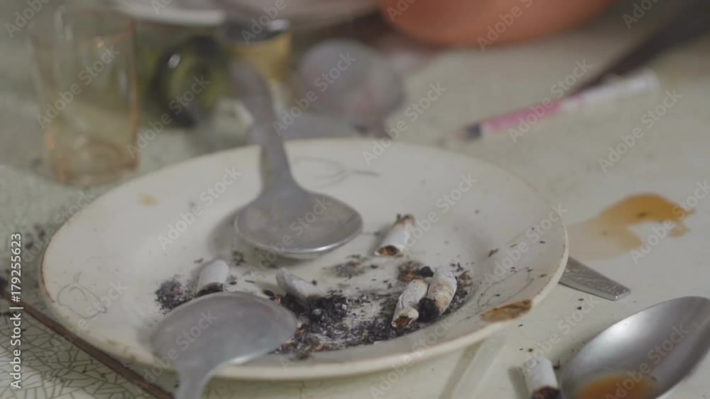 addict picks up heroin in syringe addict picks up heroin in syringe