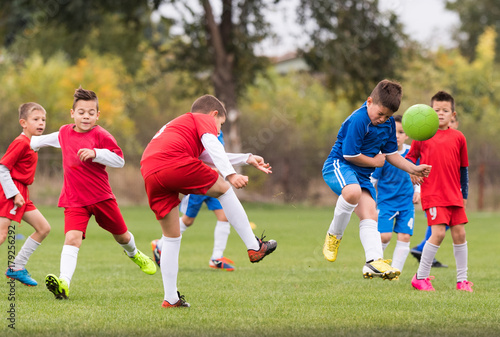 Young children players football match on soccer field © Dusan Kostic