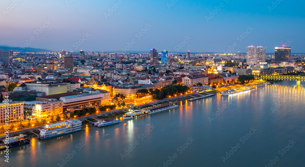 Aerial view of the Old Town in Bratislava, new bridge over Danube river with evening lights in capital city of Slovakia,Bratislava