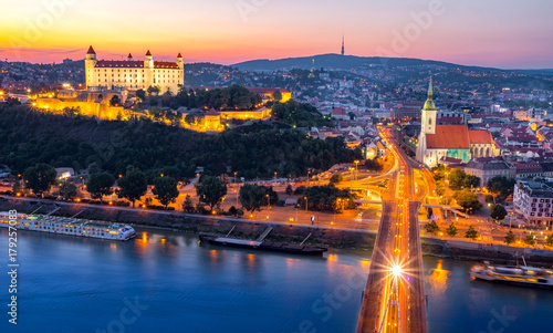 Aerial view of Bratislava castle Parliament and the New bridge over Danube river with evening lights in capital city of Slovakia Bratislava