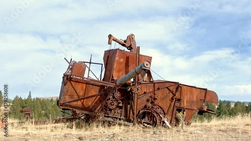 Old rusting combine tractor 1940 time lapse Western Ranch Oregon 33