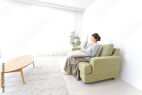 single woman being relaxed at home