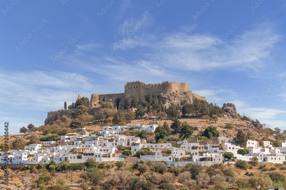 Castle view Acropolis of city Lindos of Rhodes island with big blue clean sky