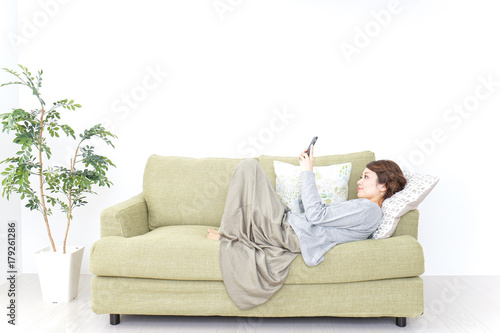 lying woman using smartphone 