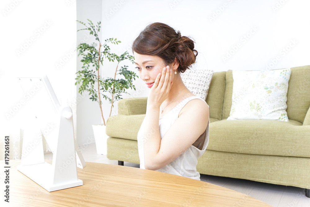 woman making herself up at home woman making herself up at home