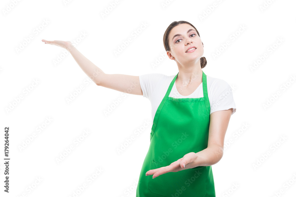 Fototapeta premium Pretty supermarket seller inviting you to come in