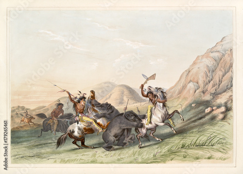 Native indian hunters kills a grizzly bear on a grassland close to some rocks. Old watercolor illustration by G. Catlin, Catlin's North American Indian Portfolio, Ackerman, New York, 1845