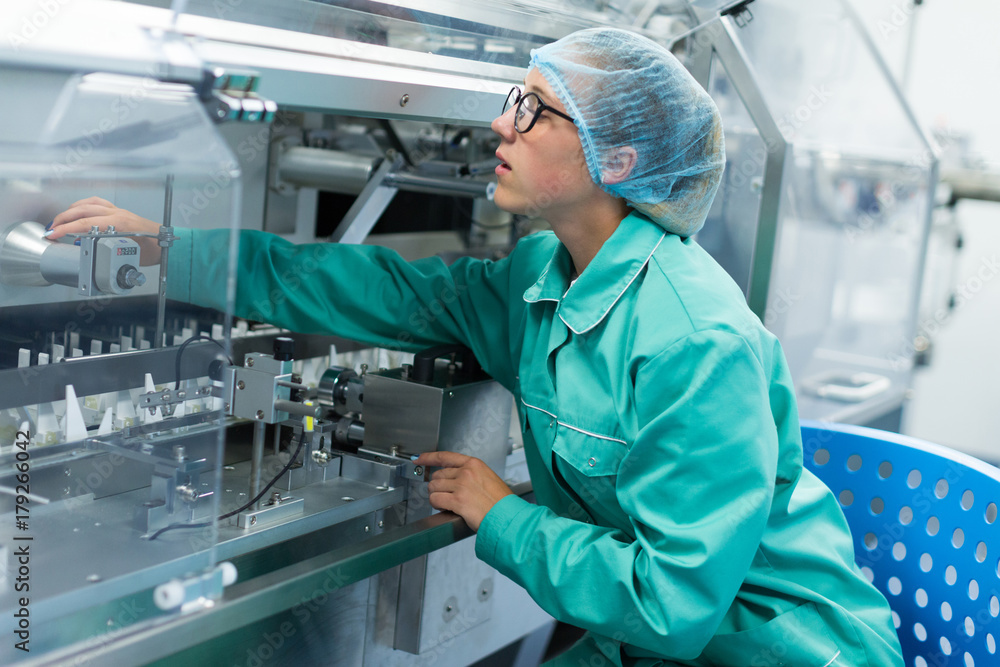 pharmaceutical factory worker at the workplace pharmaceutical factory worker at the workplace