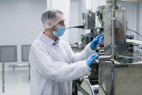 plant picture, scientist configures control panel photo