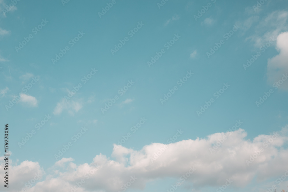 Sky Overlay: Bright teal blue sky with some clouds