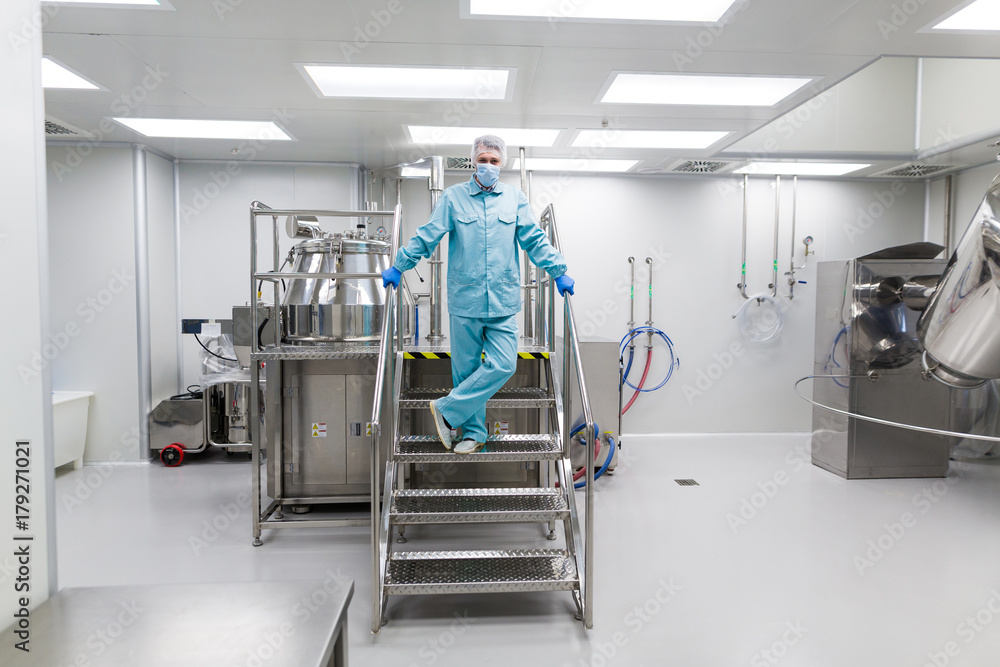 Fototapeta premium plant picture, scientist is standing on ladder in laboratory