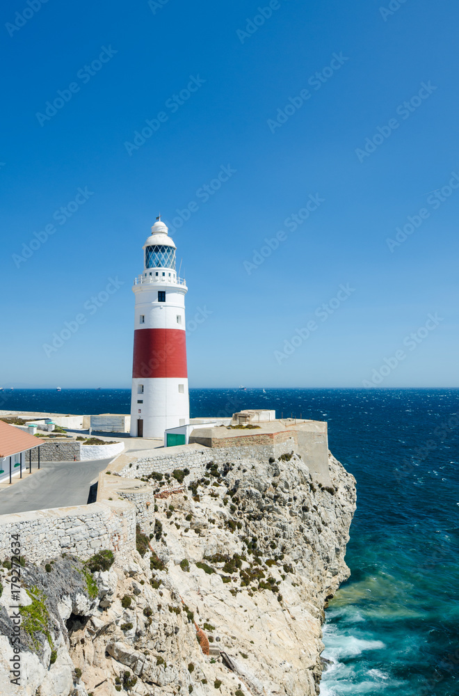 Europa Point Lighthouse (Trinity Lighthouse or Victoria Tower) on the cliff. British Overseas Territory of Gibraltar.