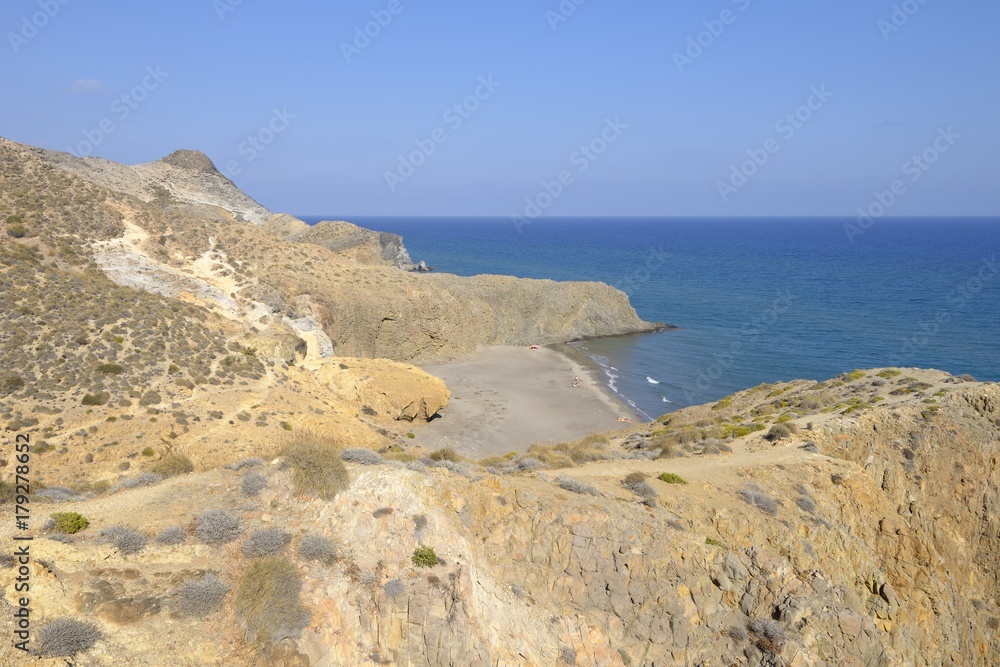 View of a secret beach near Monsul in the andalusian desert coast of the Cabo de Gata Níjar Natural Park, Almeria, Andalusia, Spain