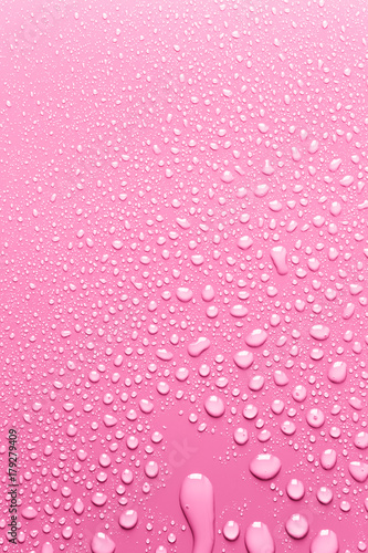 Pink surface clean with drops of water 