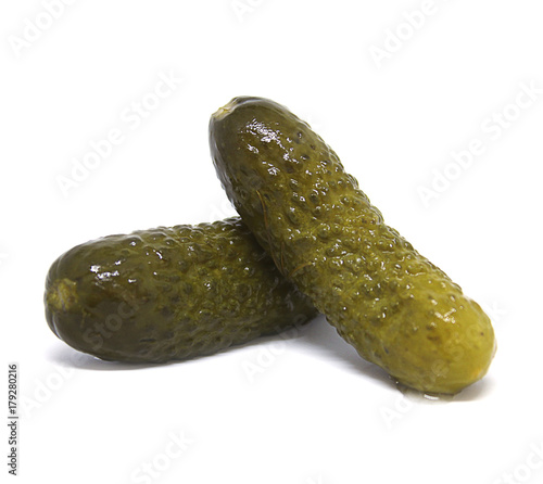 two pickles on the white background
