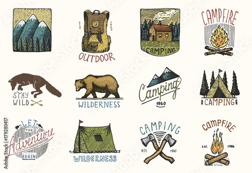 set of engraved vintage, hand drawn, old, labels or badges for camping, hiking, hunting with mountains, campfire and tent, axes. bear and backpack, wolf or red fox.