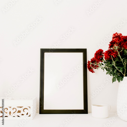 Photo frame mock up, beautiful red flowers bouquet, white vintage casket in front of white background.