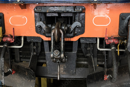 Photos Close up view if an orange clack front of a train car