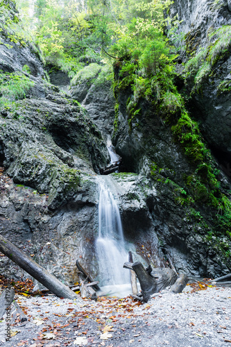 Sucha Bela gorge in Slovensky raj National park, Slovakia. Hikiing Path. Sucha Bela gorge is most popular and one of the most attractive trails. Picture shows Okienkovy vodopad waterfall. photo