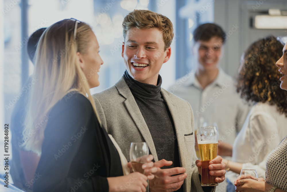 Businesspeople Enjoying After-Work Drinks Businesspeople Enjoying After-Work Drinks