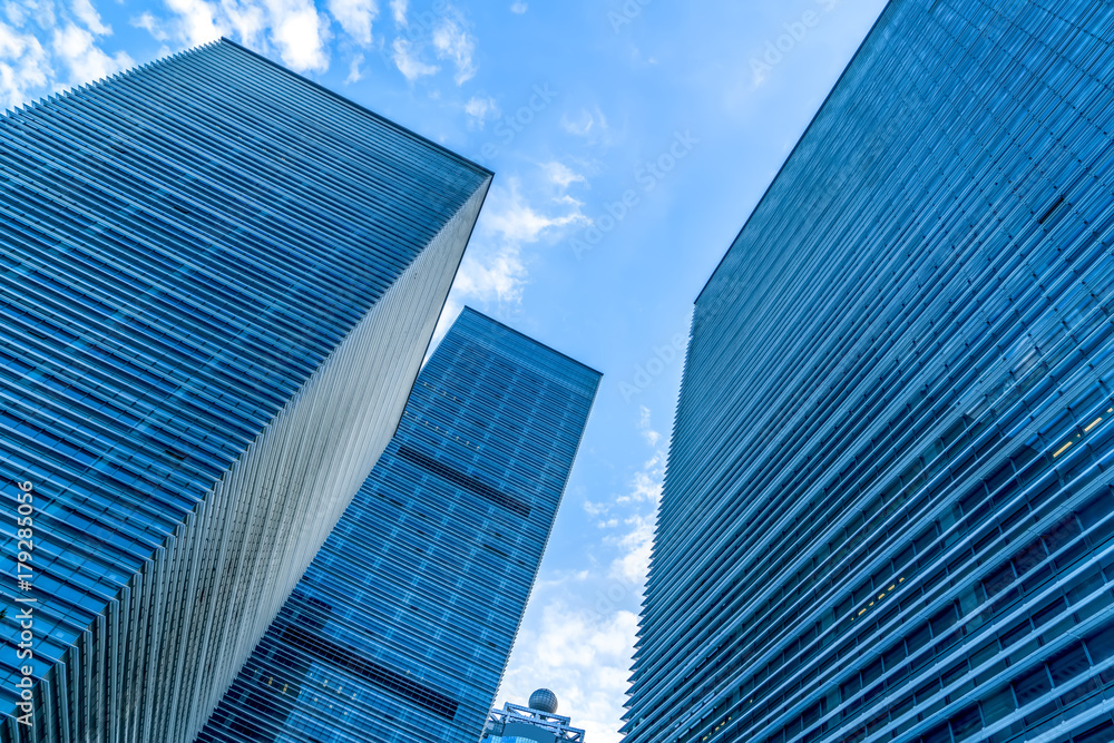 Low angle view of skyscrapers architectural glass