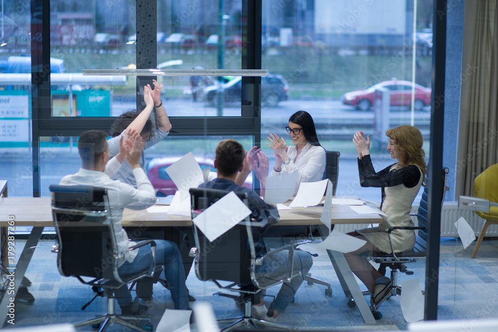 startup Group of young business people throwing documents startup Group of young business people throwing documents