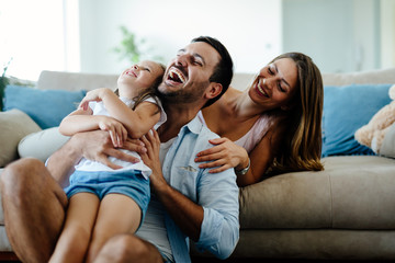 Happy familiy spending fun time at home