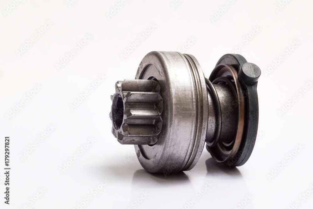Spare part of the car. Bendix starter on a white background. Spare part of the car. Bendix starter on a white background.