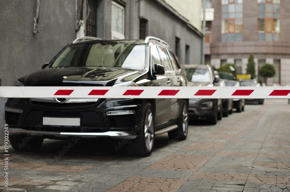 Parking behind a barrier