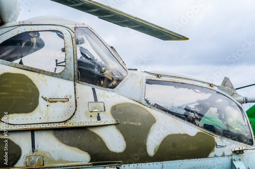 Obraz na płótnie Part of the fuselage as a background of a combat helicopter Mi 24