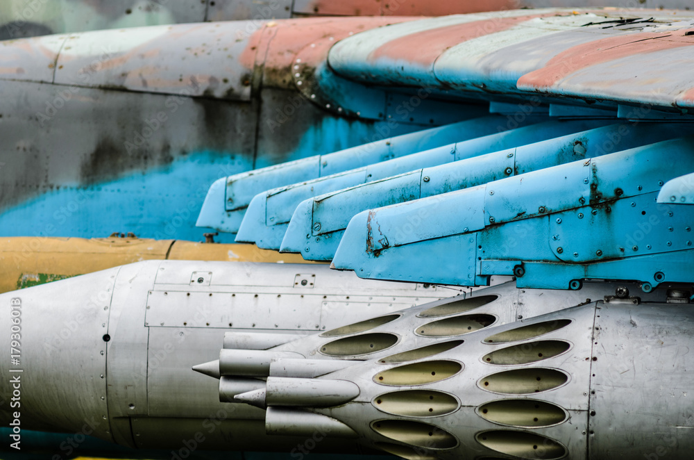 Rocket pods on Mi-24 Hind attack helicopter. The attachments of guns to the  wing of a combat helicopter Photos | Adobe Stock