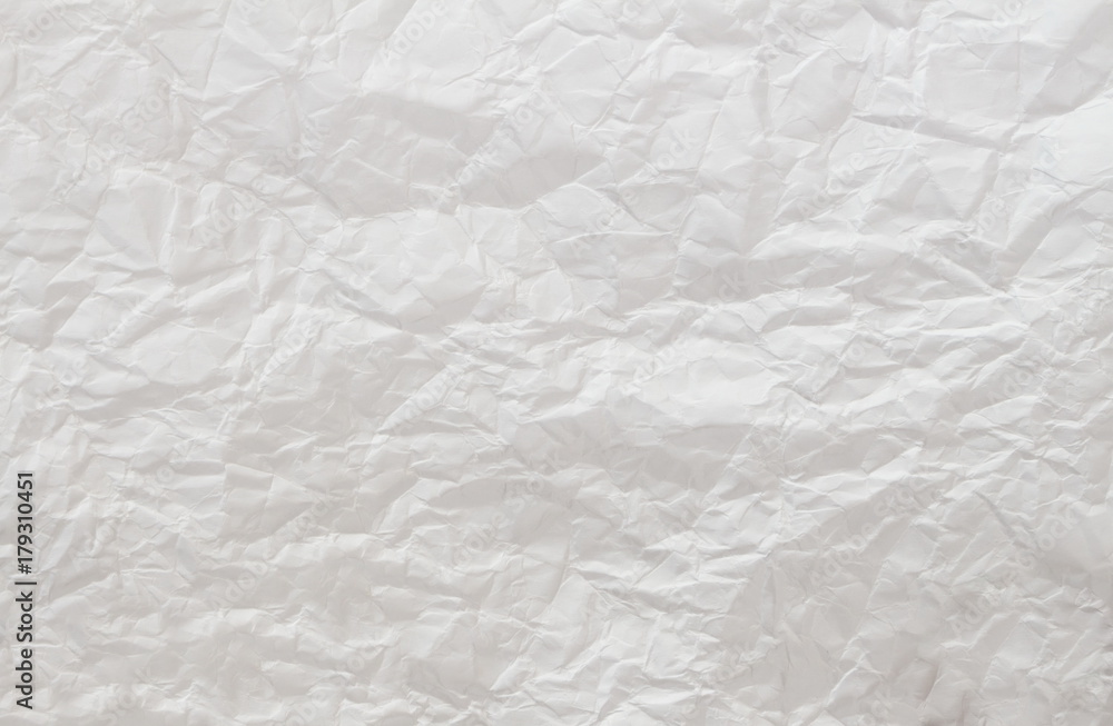 Naklejka premium Crumpled white paper background.